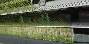 Cỏ nhân tạo bóng đá Dtex 11000 cọc cao cấp có khả năng chống tia cực tím và lỗ thoát nước thủng