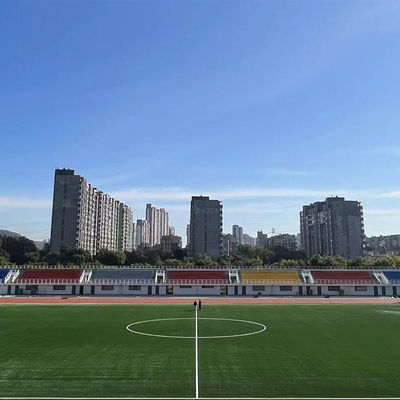 Cỏ nhân tạo bóng đá có chiều cao cọc 50mm chống tia cực tím được FIFA phê duyệt với mật độ cao và bảo trì thấp